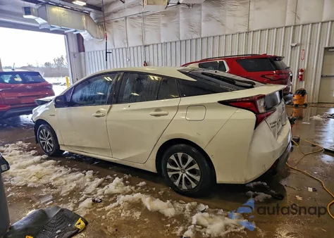 2019 Toyota Prius from USA, damaged, VIN JTDL9RFU3K3008581